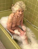 very old granny taking a bath